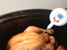 Checking the internal temp of the slow cooked roast chicken. 